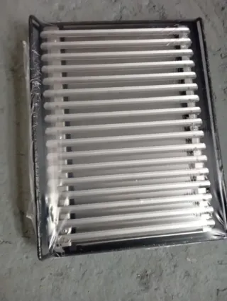 Barbacoa de metal con chimenea