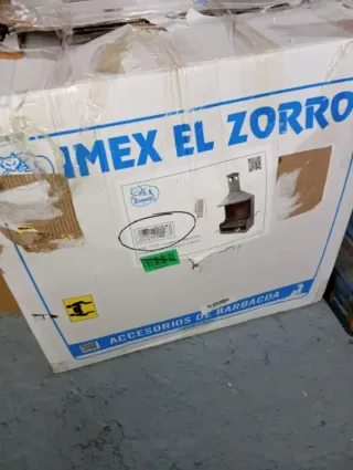 Barbacoa de metal con chimenea