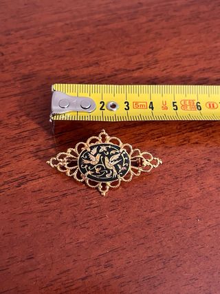 Spilla vintage dorata con uccelli