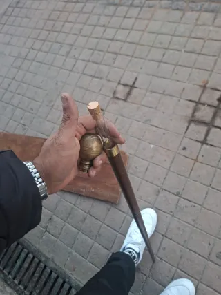 Bastón raro con brújula