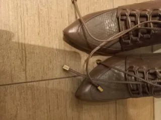 Zapatos botín cordones tacón