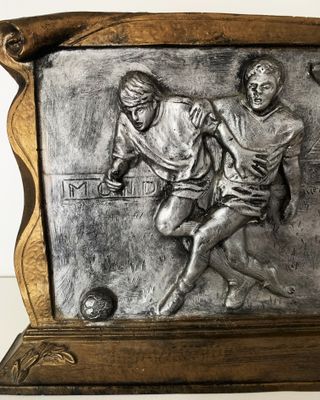 Bajorrelieve vintage trofeo de fútbol