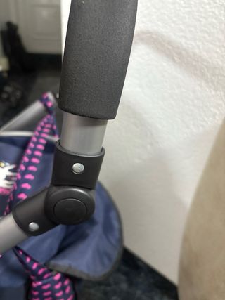 Cochecito de juguete con unicornio