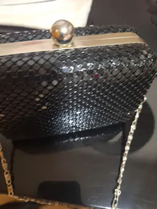 Bolso fiesta lentejuelas negro y dorado