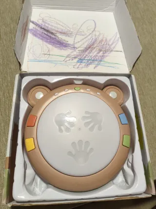 Juguete musical interactivo Tumama