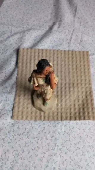 Statuette capo indiano,squaw e indiano a cavallo