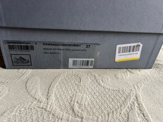 Zapatillas Hogan grises y blancas, nuevas.