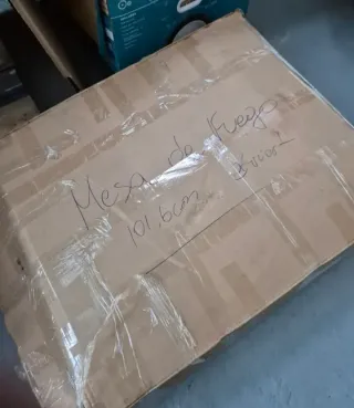 Mesa de fuego exterior con tapa de cristal