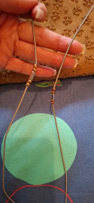 Pochette con ricamo corallini