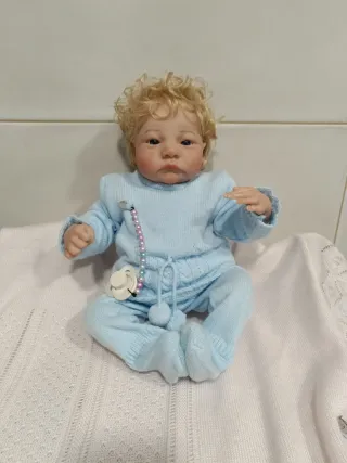 Muñeco bebé reborn rubio con chupete