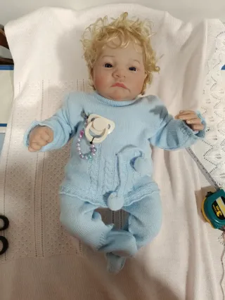 Muñeco bebé reborn rubio con chupete