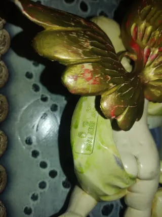 Figura de Ángel con arpa