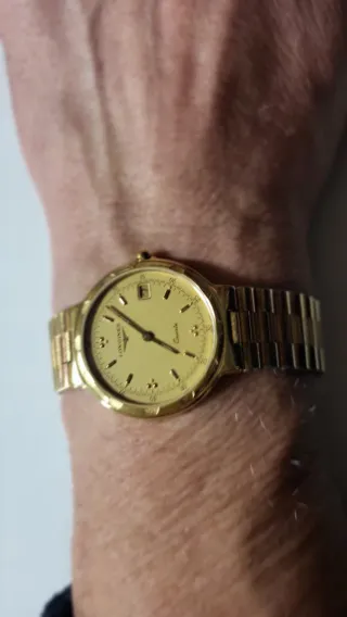 Reloj Longines Conquest chapado en oro.