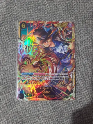 Carta Sabo OP13-120 Sec One Piece TCG