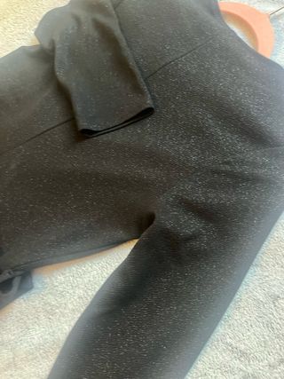 Mono Negro con toques brillantes elegante