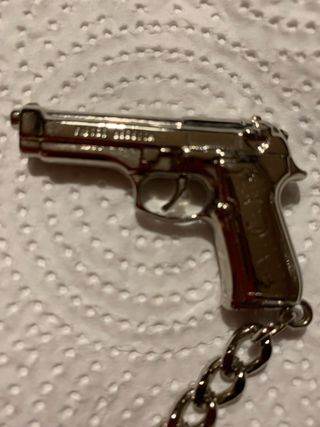 Portachiavi pistola ottone argentato