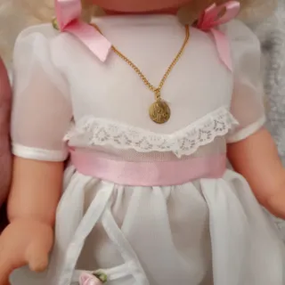 Muñeca primera  comunión Famosa