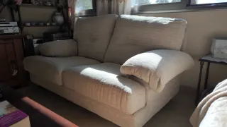 Sofá biplaza beige de tela