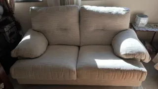 Sofá biplaza beige de tela