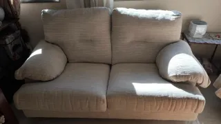 Sofá biplaza beige de tela