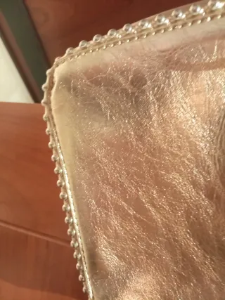 Bolso bandolera Stradivarius dorado