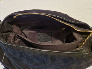 Bolso negro con flecos