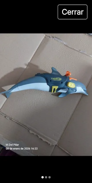 Muñeco Action Man con bolso,delfín y  brújula