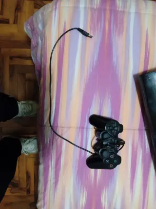 PlayStation 3 con controller e giochi formattata