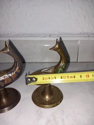 Figuras de bronce antiguas estilo pez