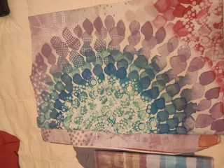 Funda nórdica, bajera y almohadón rosa y morado.