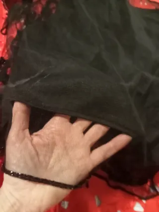 Sottogiacca nero con paillettes