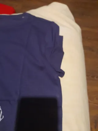 Camisetas deportivas Reebok azul y morado