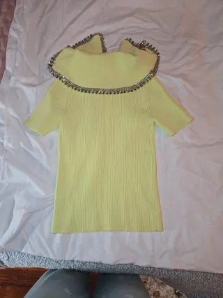 Jersey cuello joya Zara