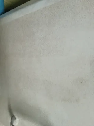 Mueble de cocina beige y verde azulado