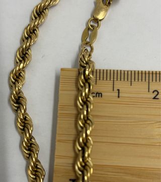 Pulsera de cordón de oro