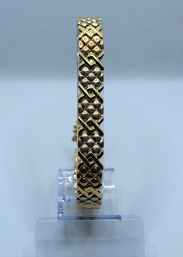 Pulsera de oro combinado 18k, 24.68 g, 22 cm.
