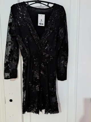 Mono corto negro lentejuelas manga larga