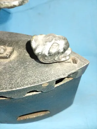 Plancha antigua de carbón