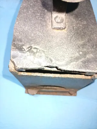 Plancha antigua de carbón