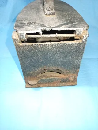 Plancha antigua de carbón