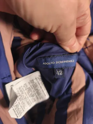 Chaqueta reversible plumas beige y azul