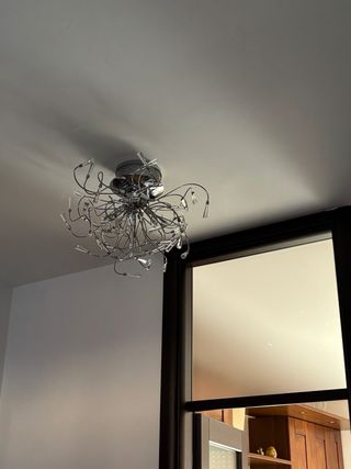 Lampadario moderno argento e trasparente
