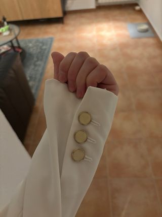 Americana blanca cruzada