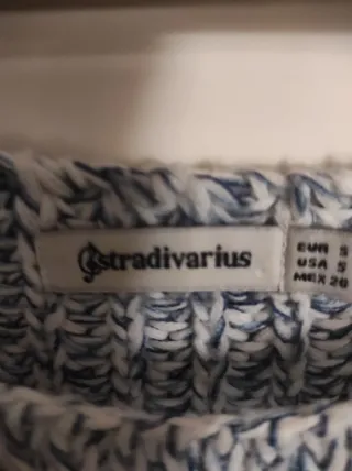 Vaqueros y jersey azul/gris