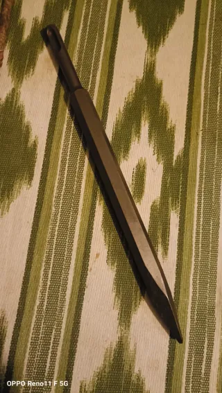 Cincel nuevo de  punta y brocas varias