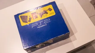 PS2 Slim Plata + Mando + EyeToy + 4 Juegos