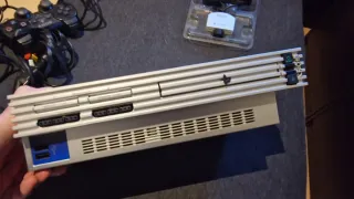 PS2 Slim Plata + Mando + EyeToy + 4 Juegos