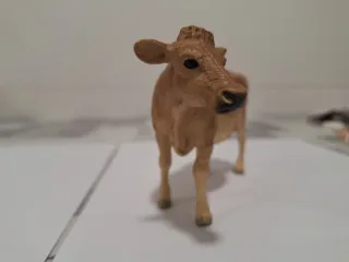 Figura vaca miniatura para belén