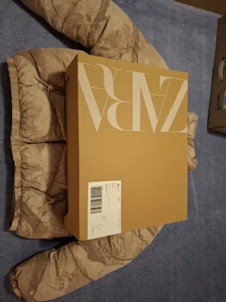 Chaqueta acolchada beige con estampado HOMBRE