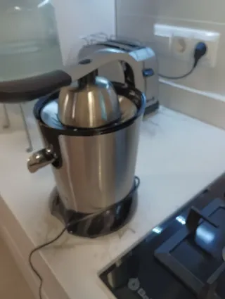 Exprimidor de acero inoxidable